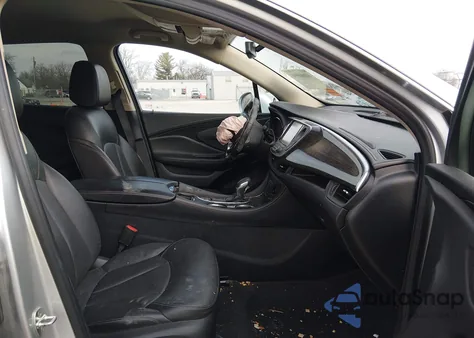 2017 Buick Envision Essence z USA, uszkodzony, nr VIN LRBFXBSA8HD045374